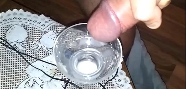  ten thick squirts of hot cum in a glass with slowmotion